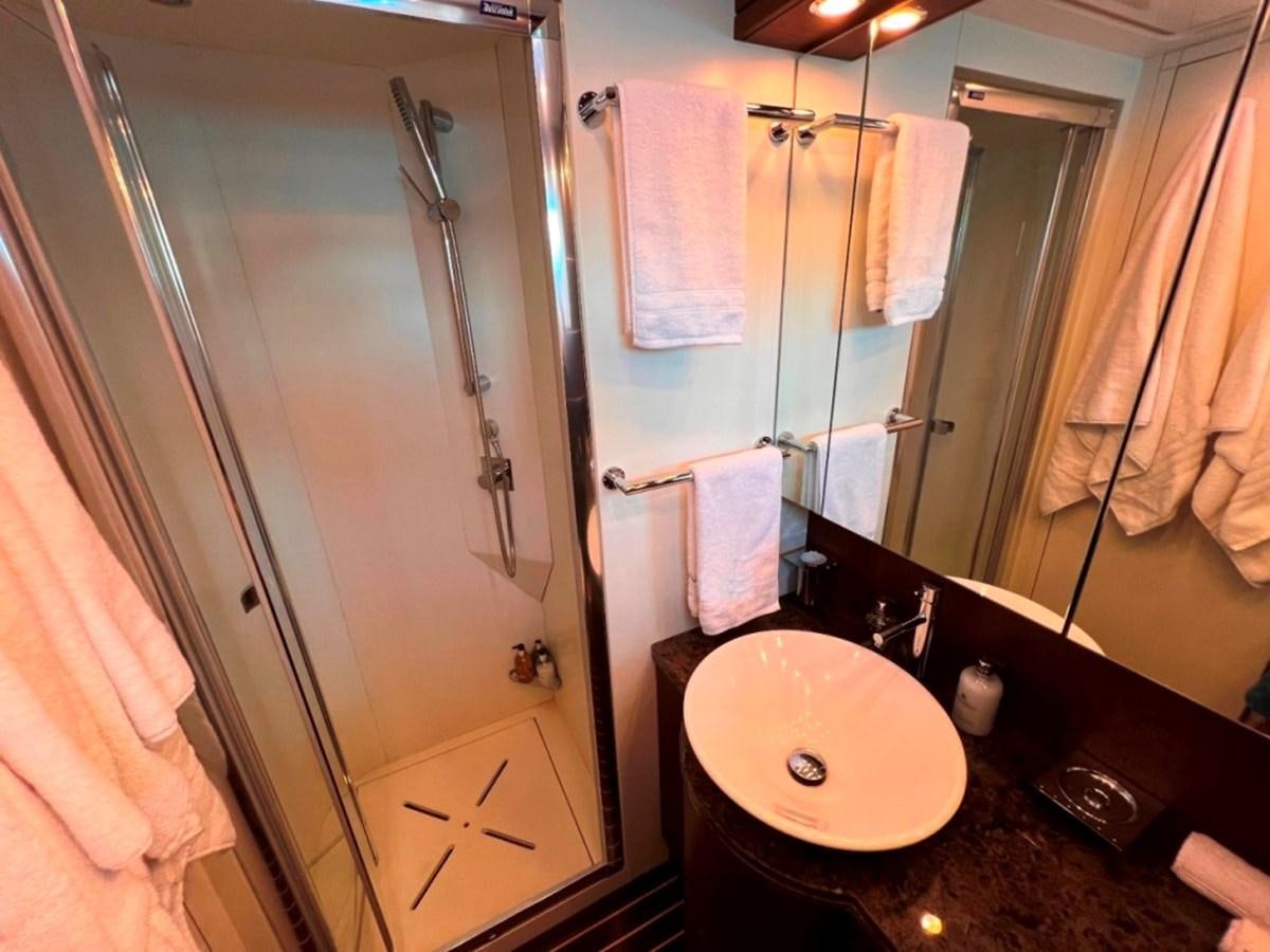 a bathroom with a sink and a shower aboard MAIORA 26 Yacht for Sale