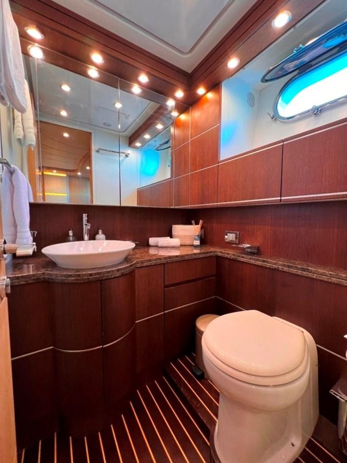 a bathroom with a sink and toilet aboard MAIORA 26 Yacht for Sale