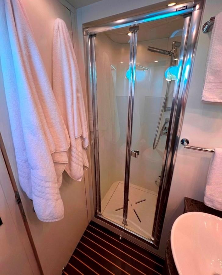 a shower with a glass door aboard MAIORA 26 Yacht for Sale