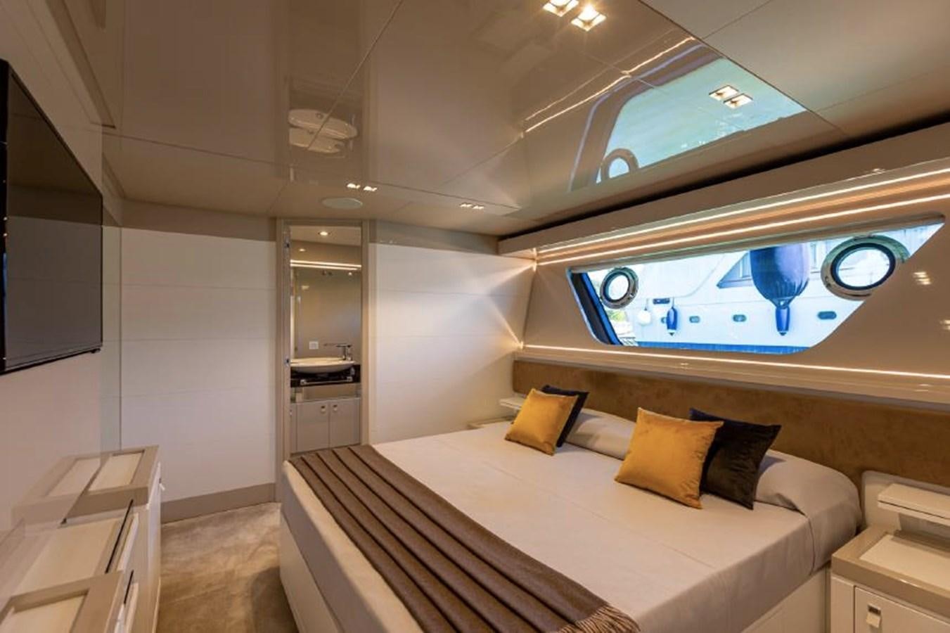 a bed in a room aboard MIOTU 4 Yacht for Sale