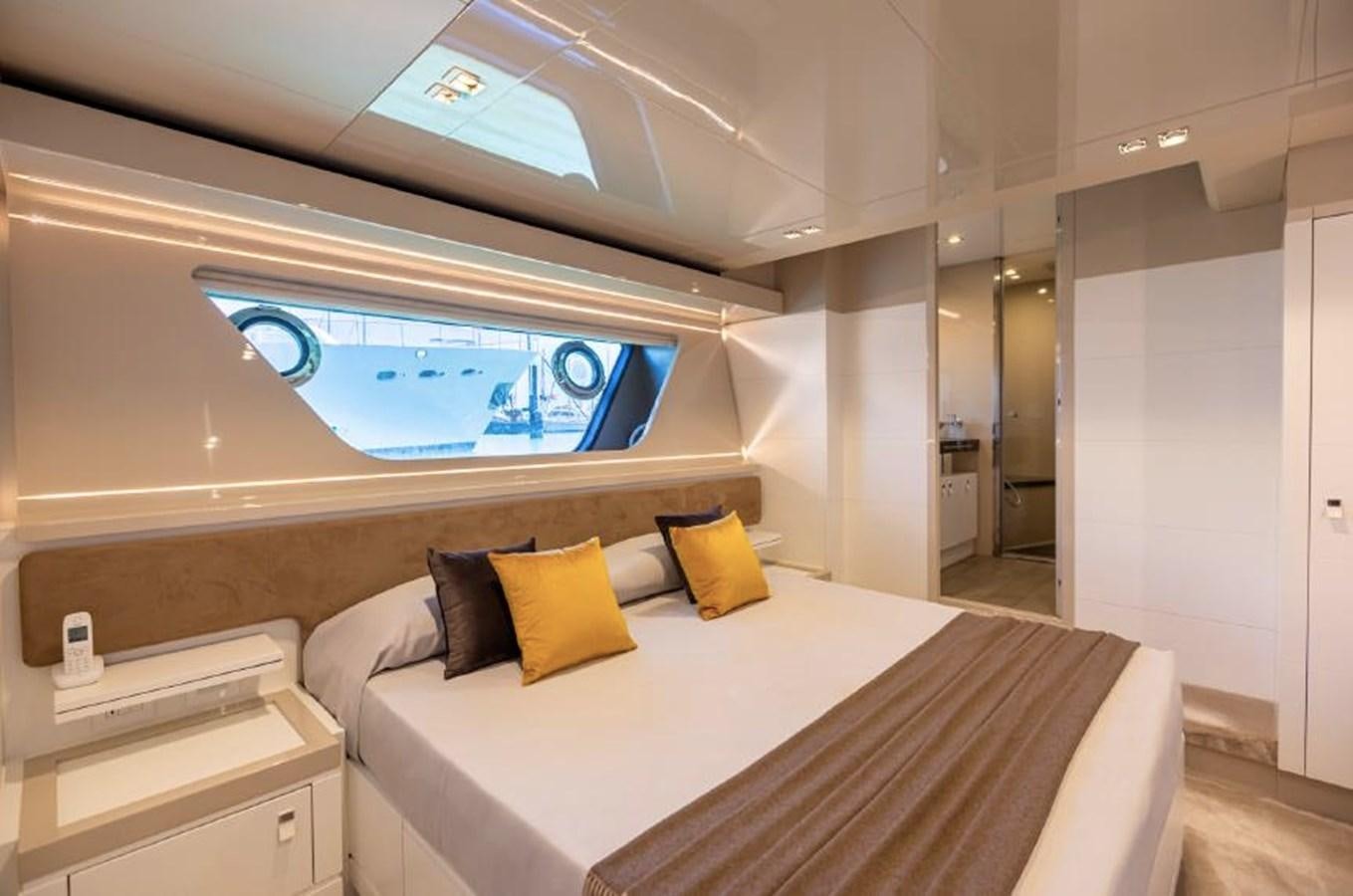 a bed in a room aboard MIOTU 4 Yacht for Sale