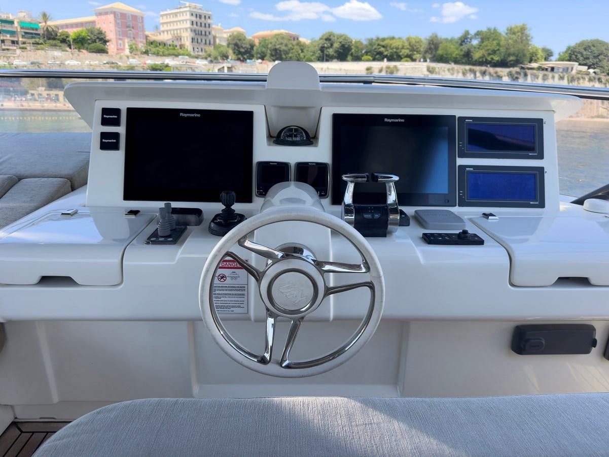 the inside of a car aboard TYCHE Yacht for Sale