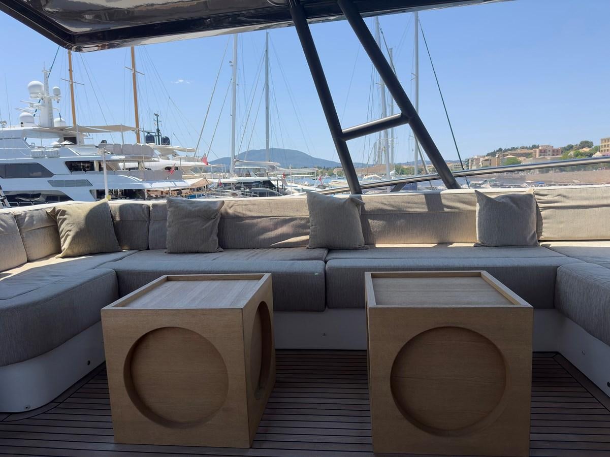 a couch with a table on it aboard TYCHE Yacht for Sale