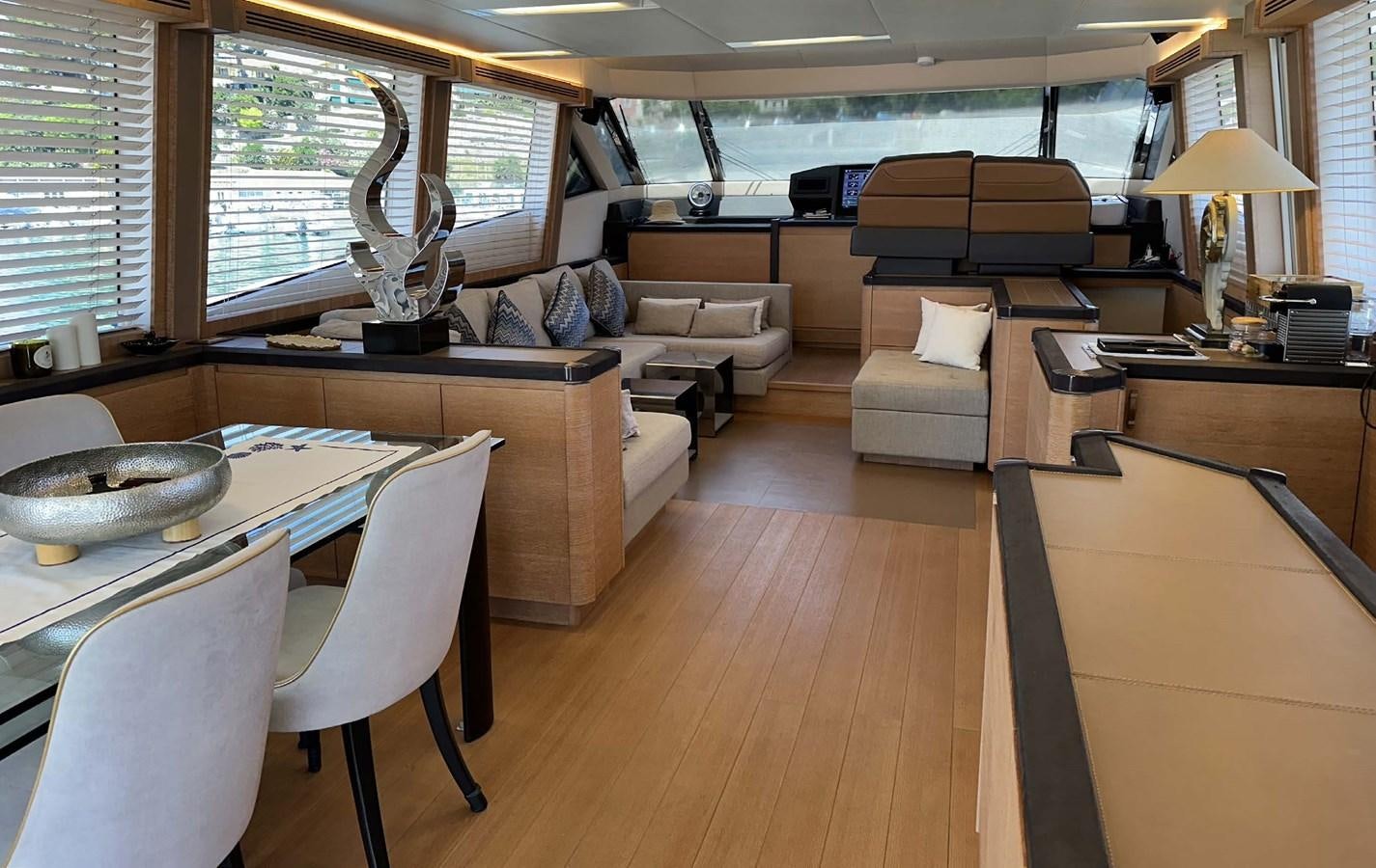 a room with a table and chairs aboard TYCHE Yacht for Sale