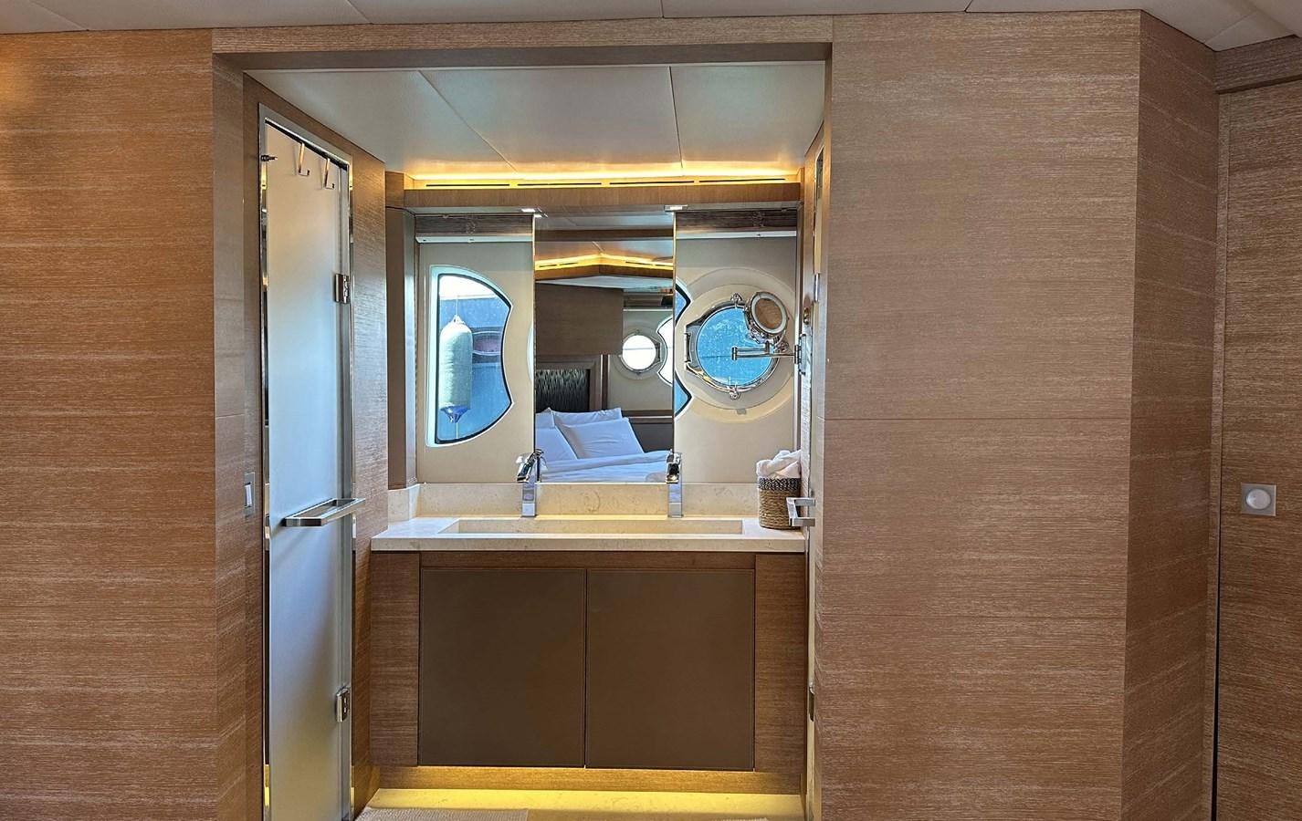 a bathroom with a large mirror aboard TYCHE Yacht for Sale