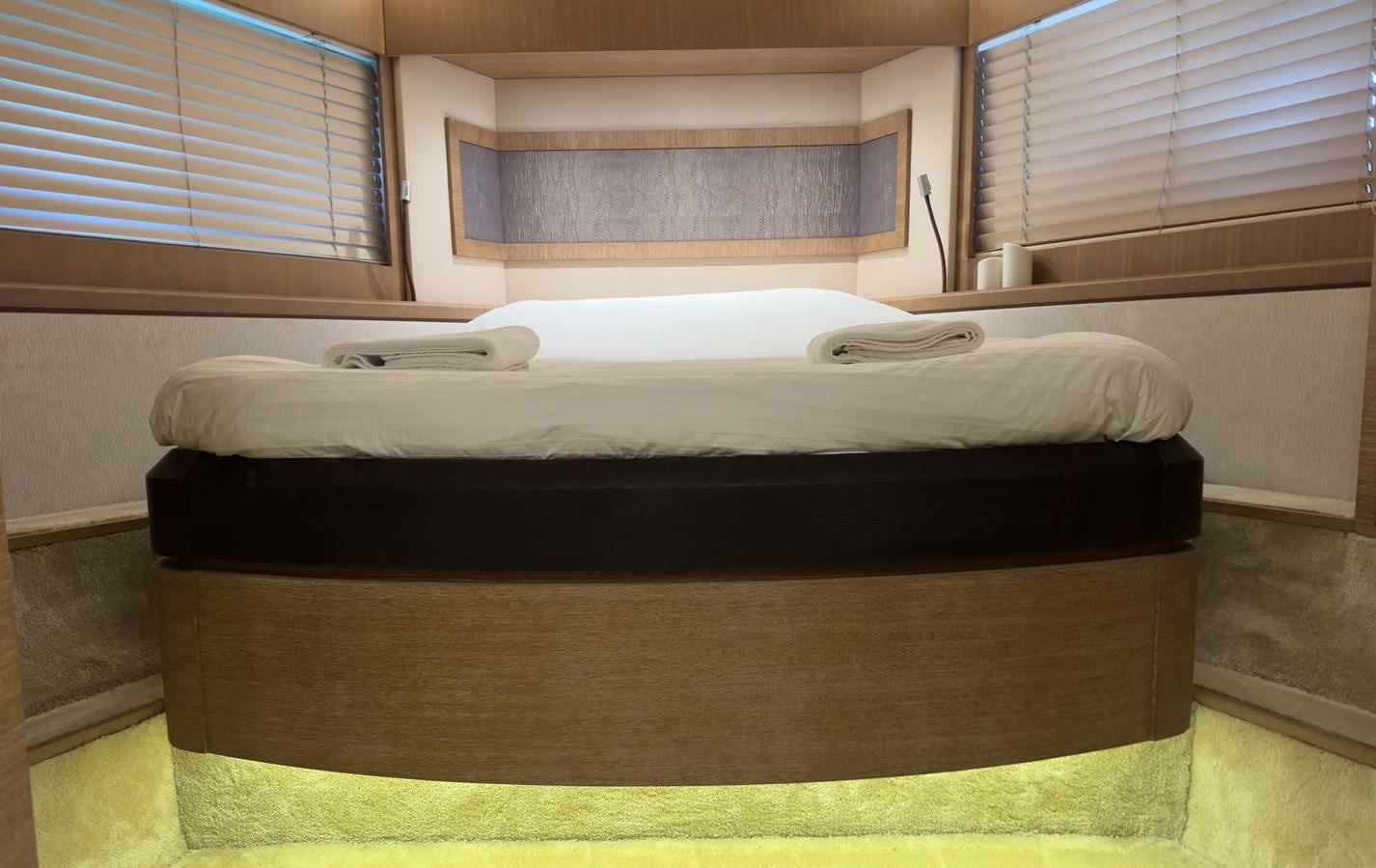 a bed in a room aboard TYCHE Yacht for Sale