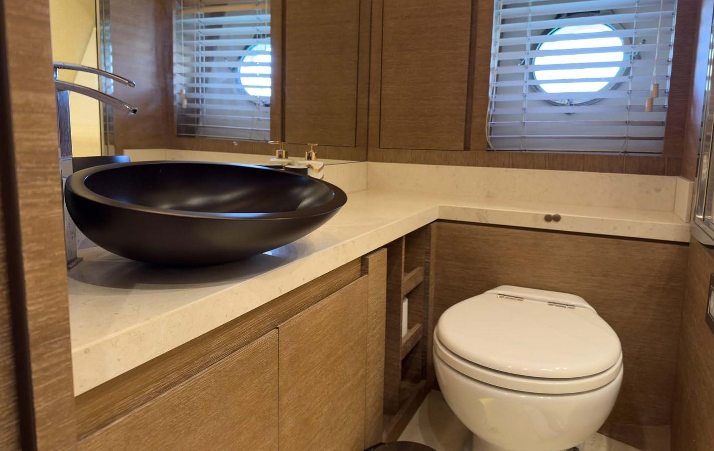 a bathroom with a sink and a toilet aboard TYCHE Yacht for Sale