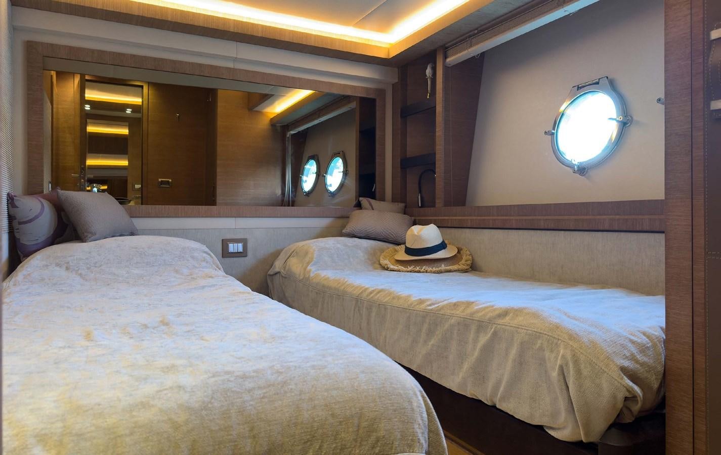a couple of beds in a room aboard TYCHE Yacht for Sale