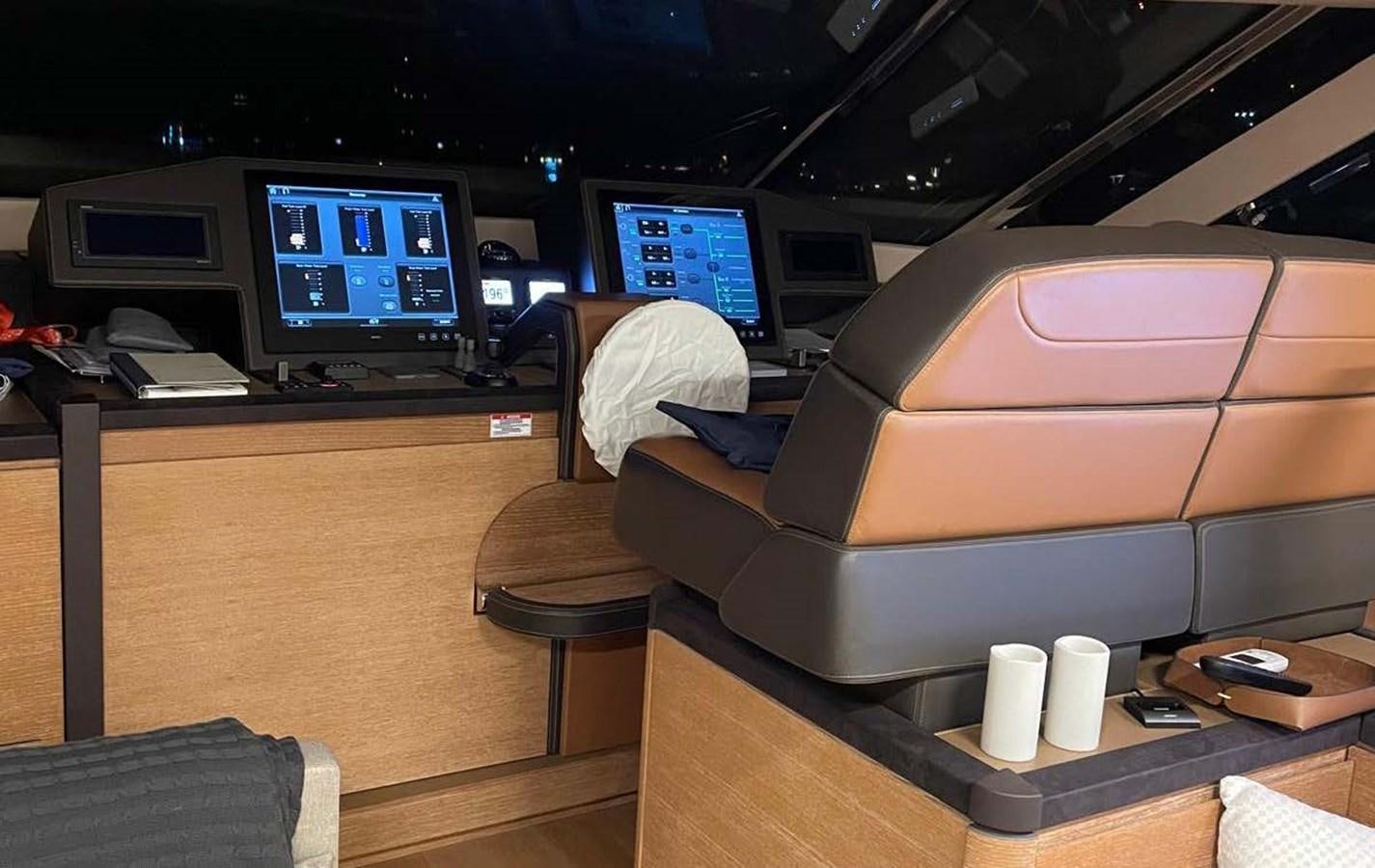 a person sleeping on a desk aboard TYCHE Yacht for Sale