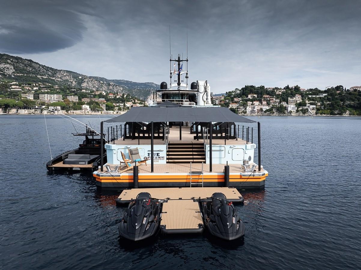 a large boat in the water aboard FIVE OCEANS Yacht for Sale