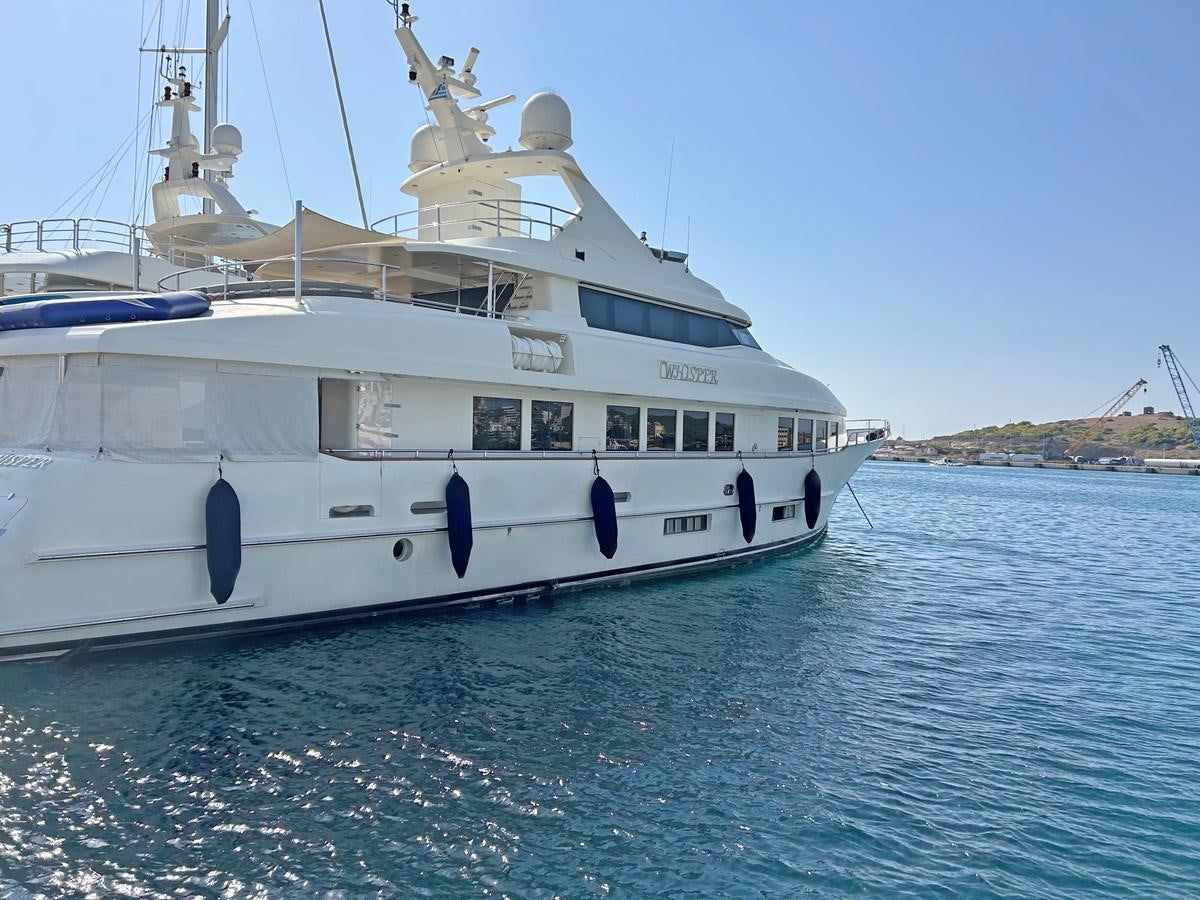 a white boat on the water aboard WHISPER Yacht for Sale