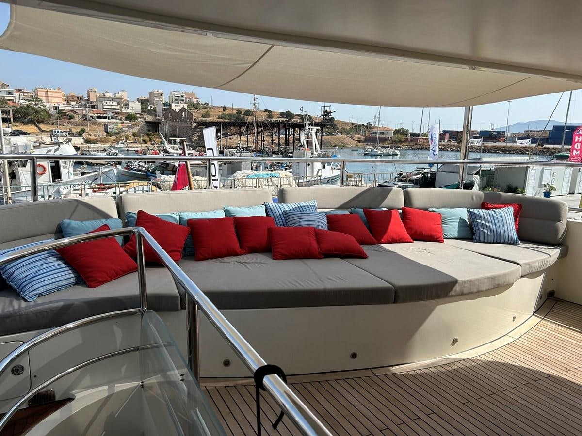 a large living room with a view of the city aboard WHISPER Yacht for Sale