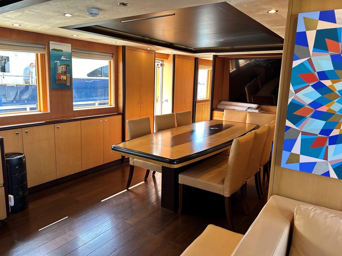 a room with a table and chairs aboard WHISPER Yacht for Sale