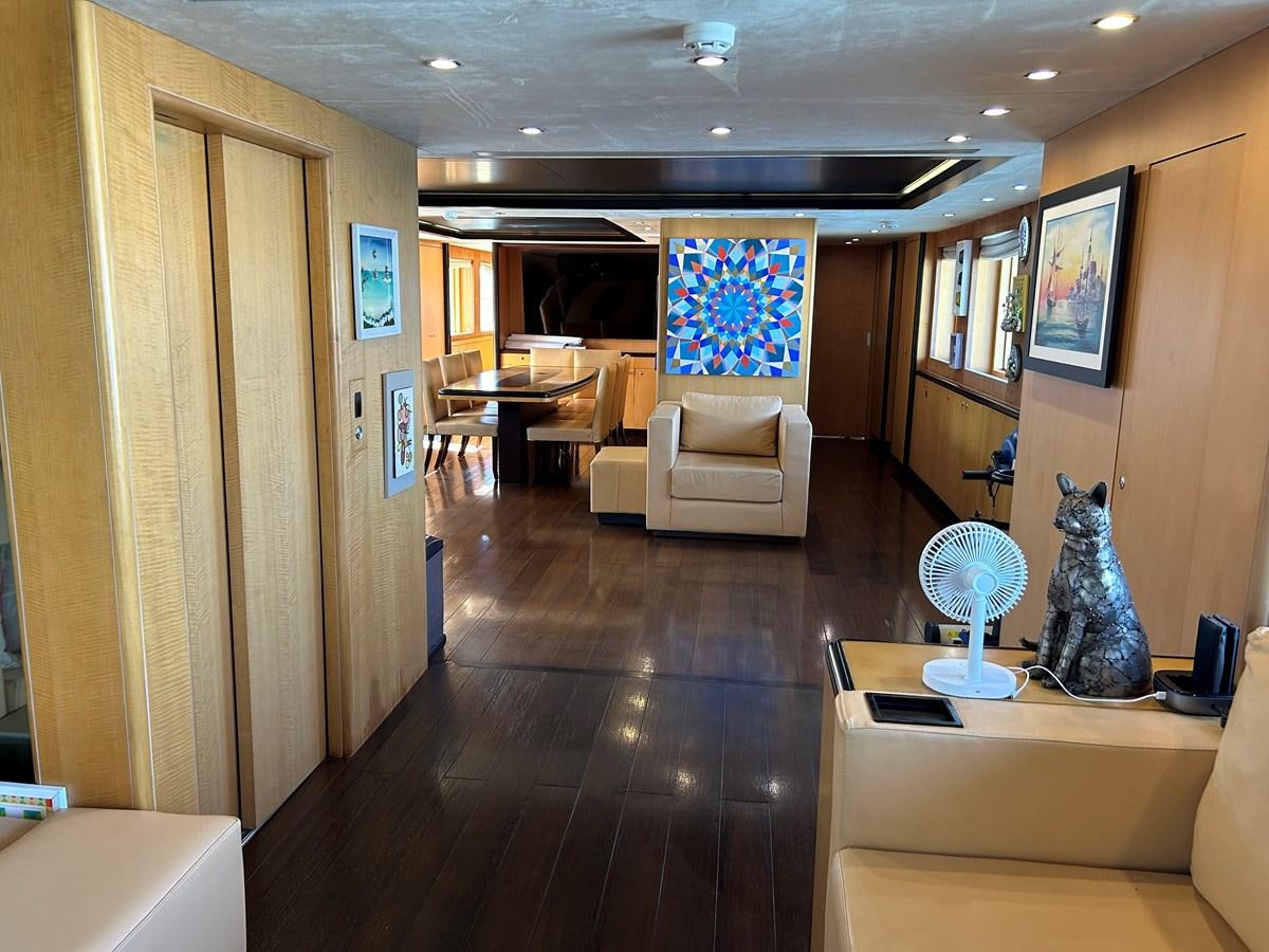 a room with a wood floor and a large mirror aboard WHISPER Yacht for Sale