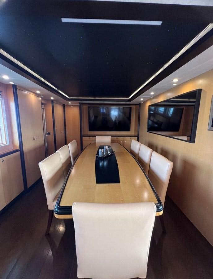 a table and chairs in a room aboard WHISPER Yacht for Sale