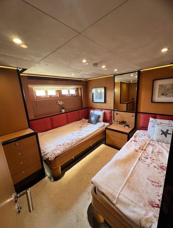 a bedroom with two beds aboard WHISPER Yacht for Sale