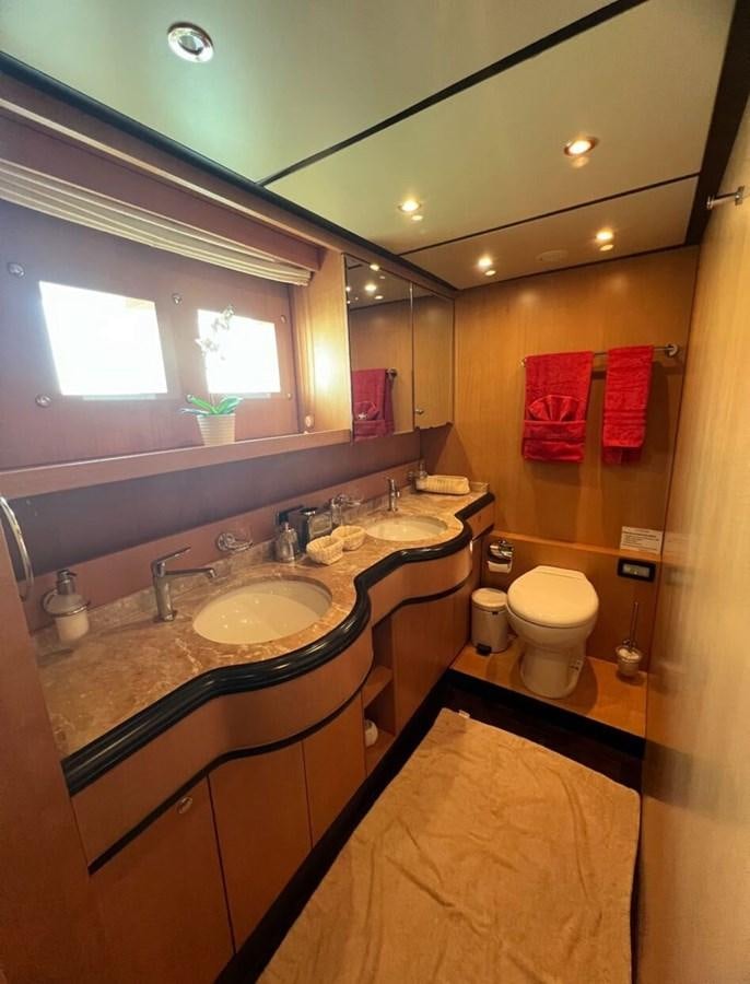 a bathroom with a sink and toilet aboard WHISPER Yacht for Sale