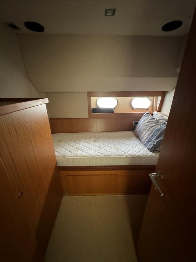 a bed in a room aboard WHISPER Yacht for Sale