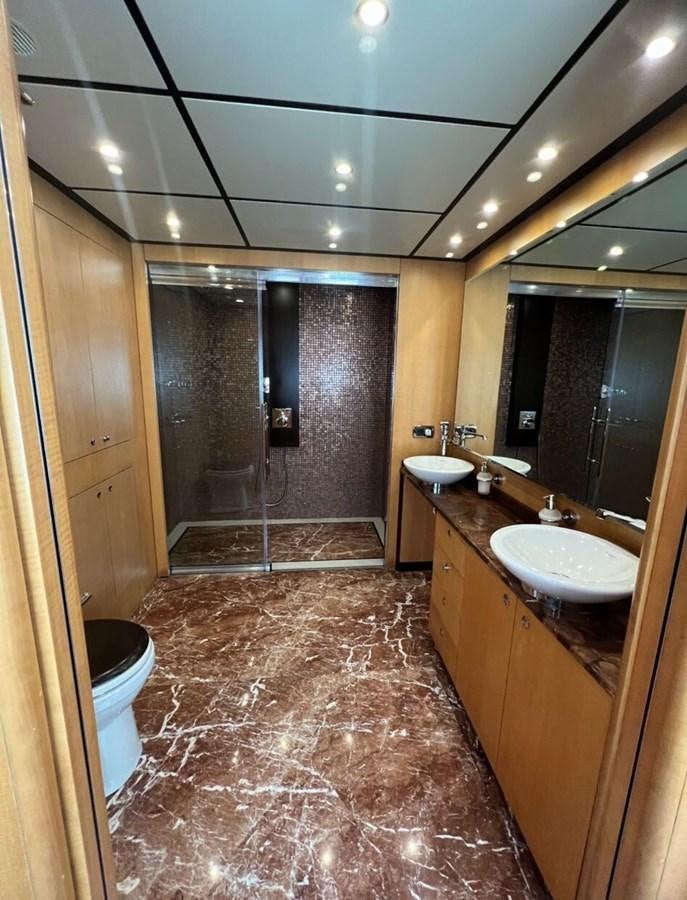 a bathroom with a sink and a toilet aboard WHISPER Yacht for Sale