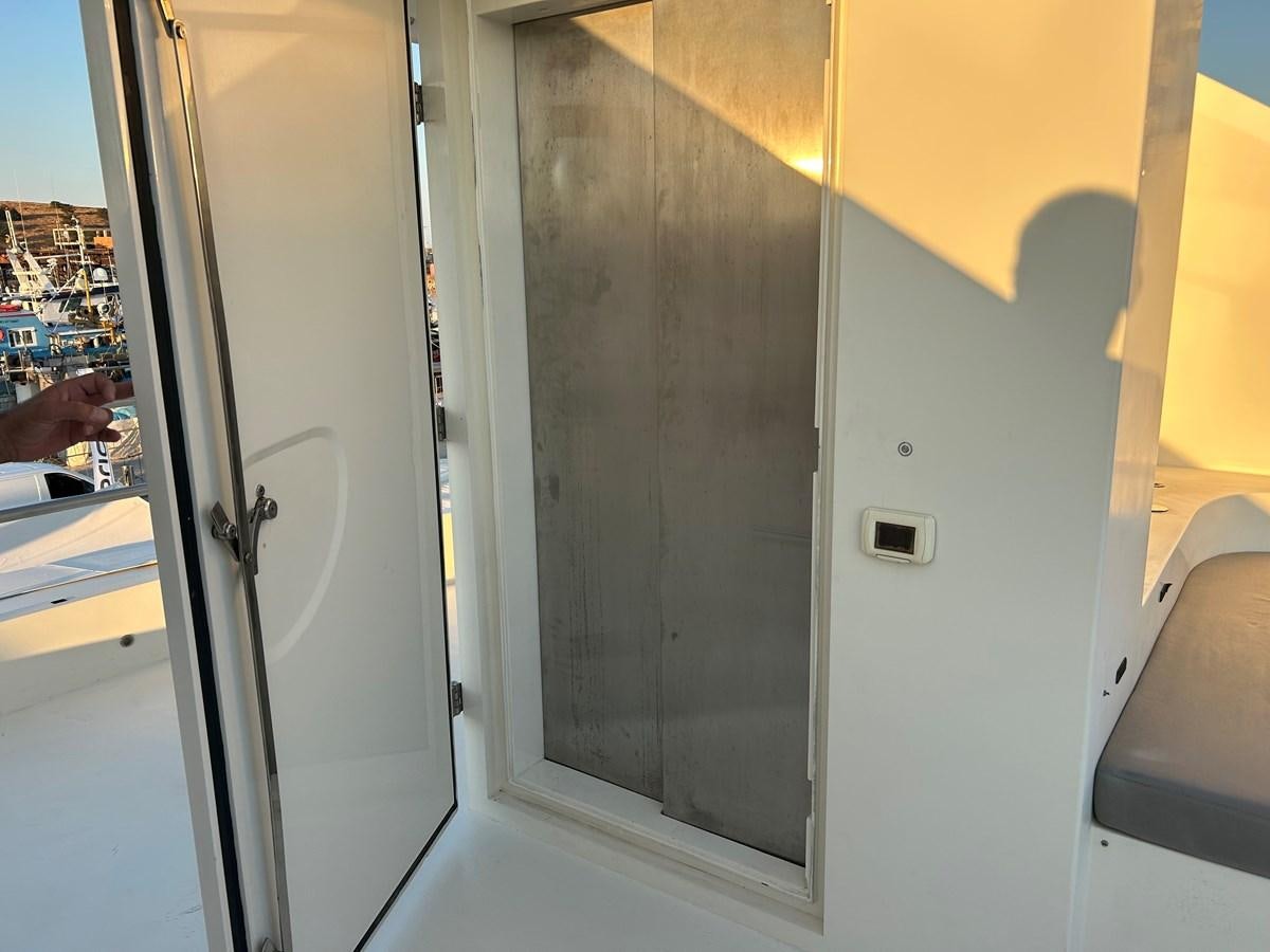 a door with a handle aboard WHISPER Yacht for Sale