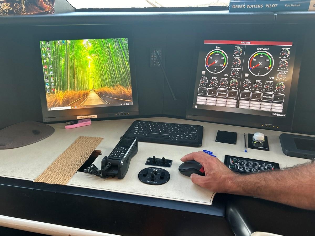 a person playing a video game aboard WHISPER Yacht for Sale