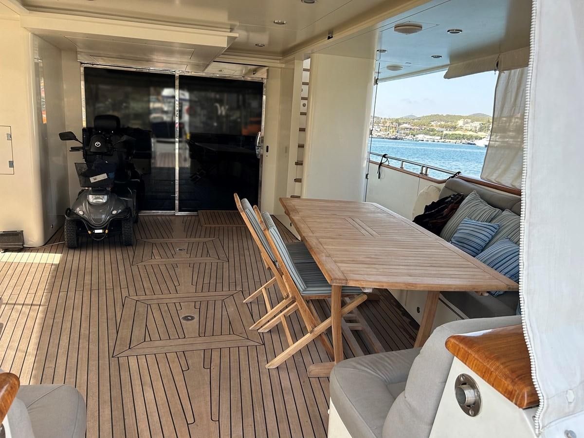 a room with a table and chairs aboard WHISPER Yacht for Sale