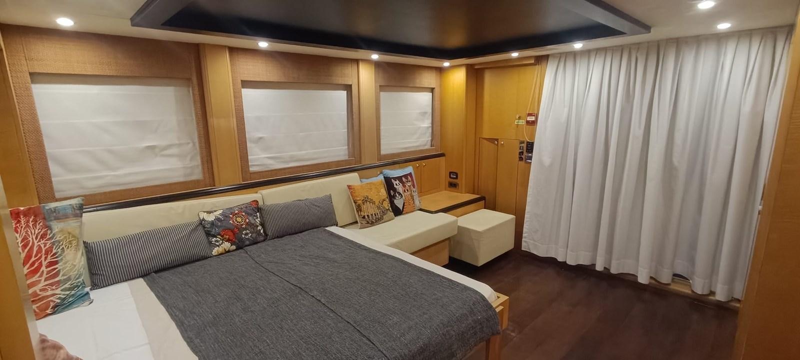 a large bedroom with a large bed aboard WHISPER Yacht for Sale