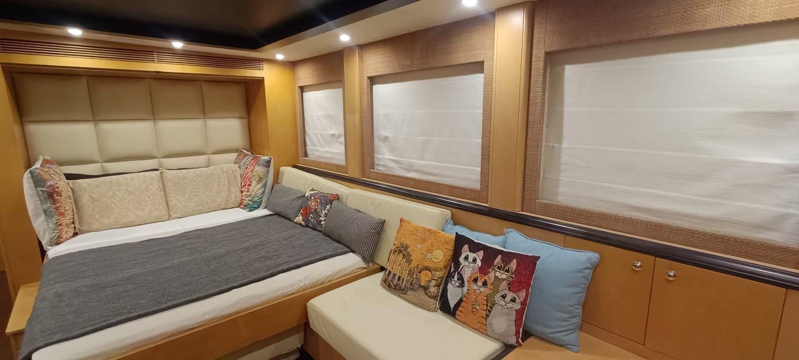 a bed in a room aboard WHISPER Yacht for Sale