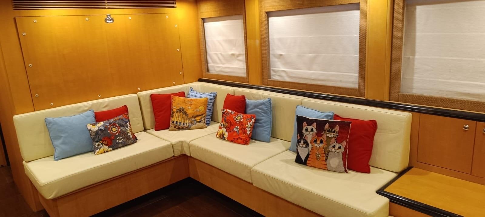 a bed with pillows on it aboard WHISPER Yacht for Sale