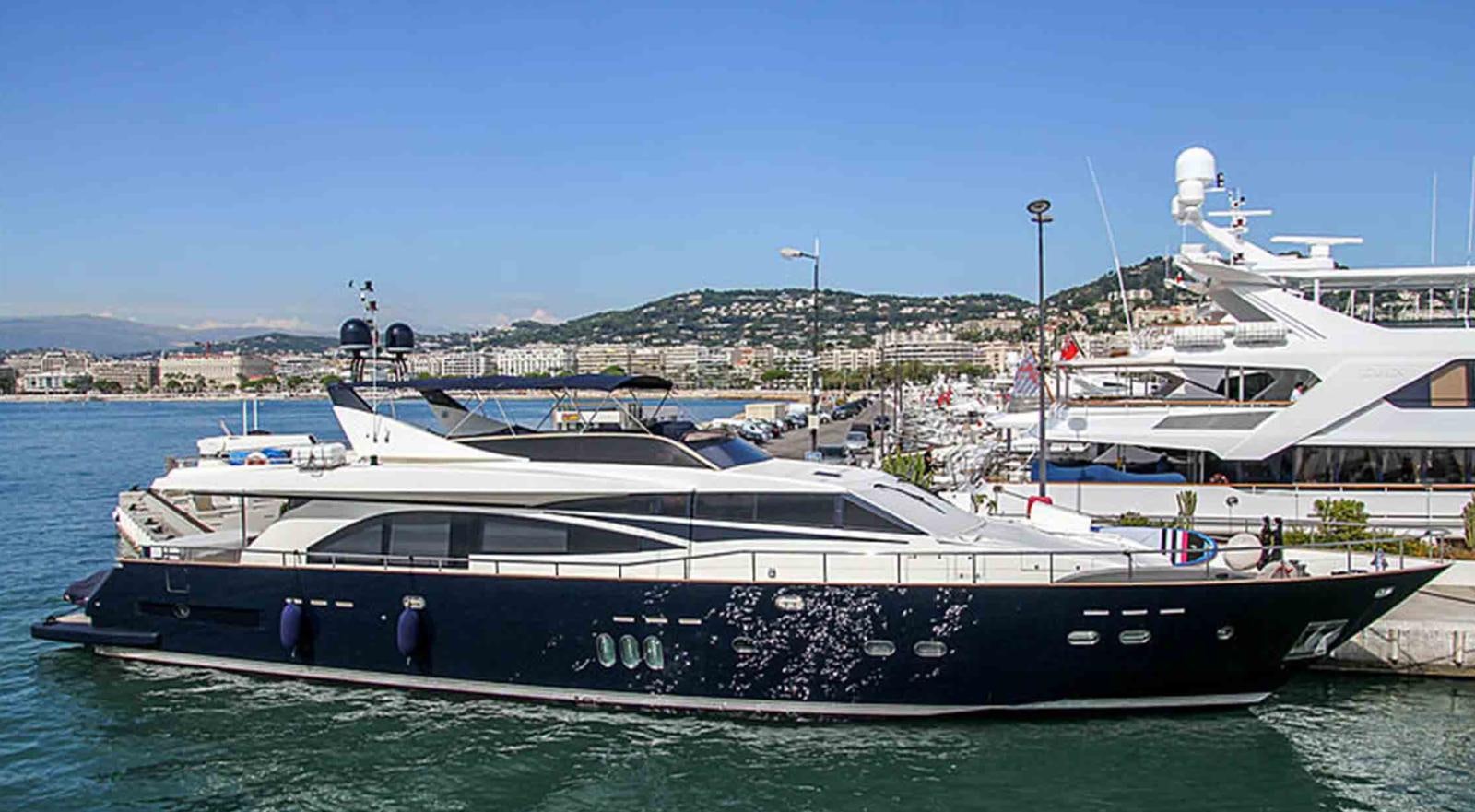 a couple of boats docked aboard COUACH 3000 FLY Yacht for Sale