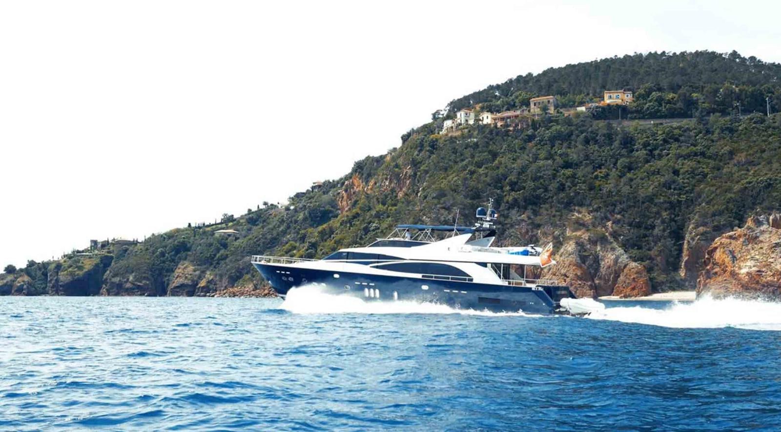 a boat on the water aboard COUACH 3000 FLY Yacht for Sale