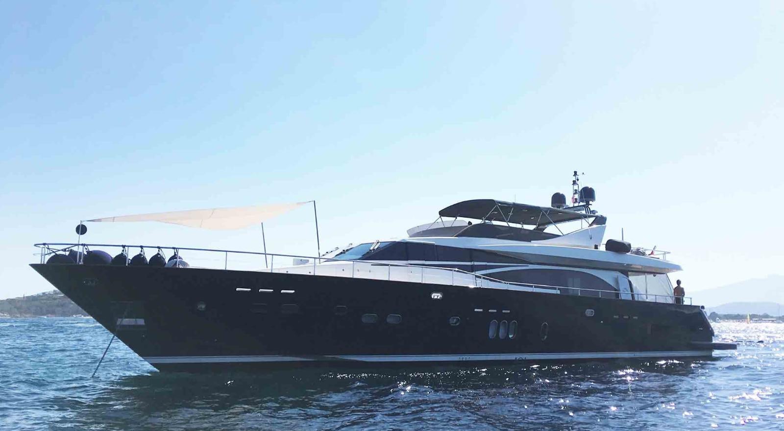 a large boat in the water aboard COUACH 3000 FLY Yacht for Sale