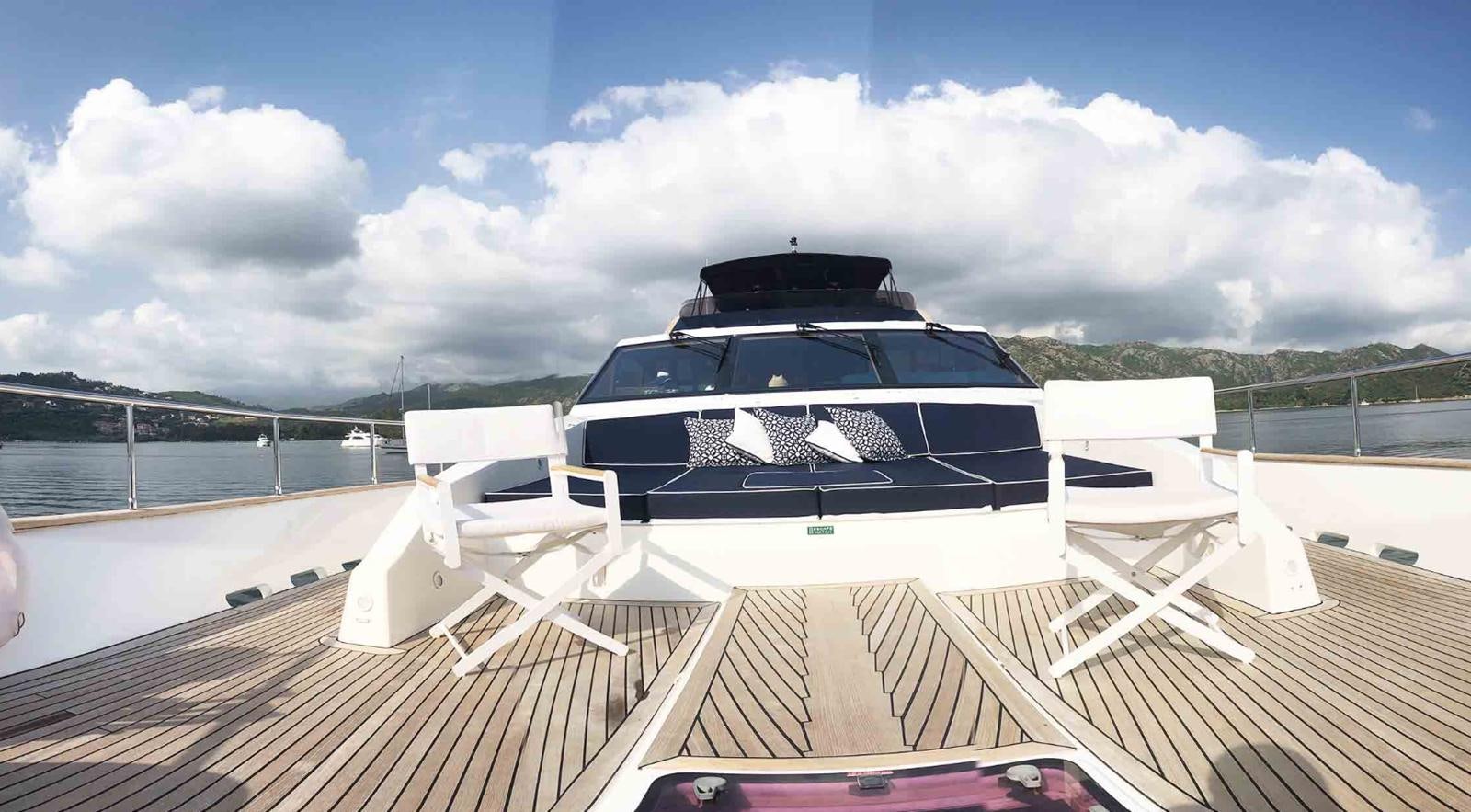 a boat on a dock aboard COUACH 3000 FLY Yacht for Sale