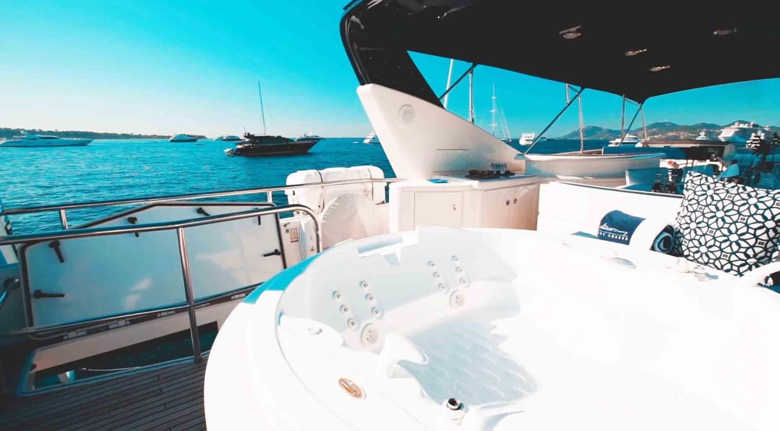 a boat on the water aboard COUACH 3000 FLY Yacht for Sale