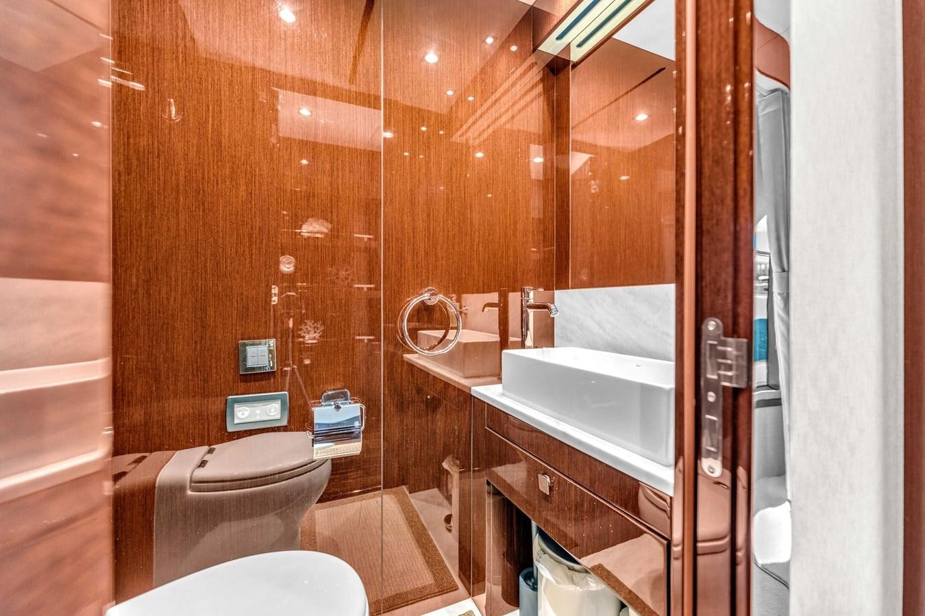 a bathroom with a sink and toilet aboard 2018 SUNSEEKER 95 YACHT Yacht for Sale