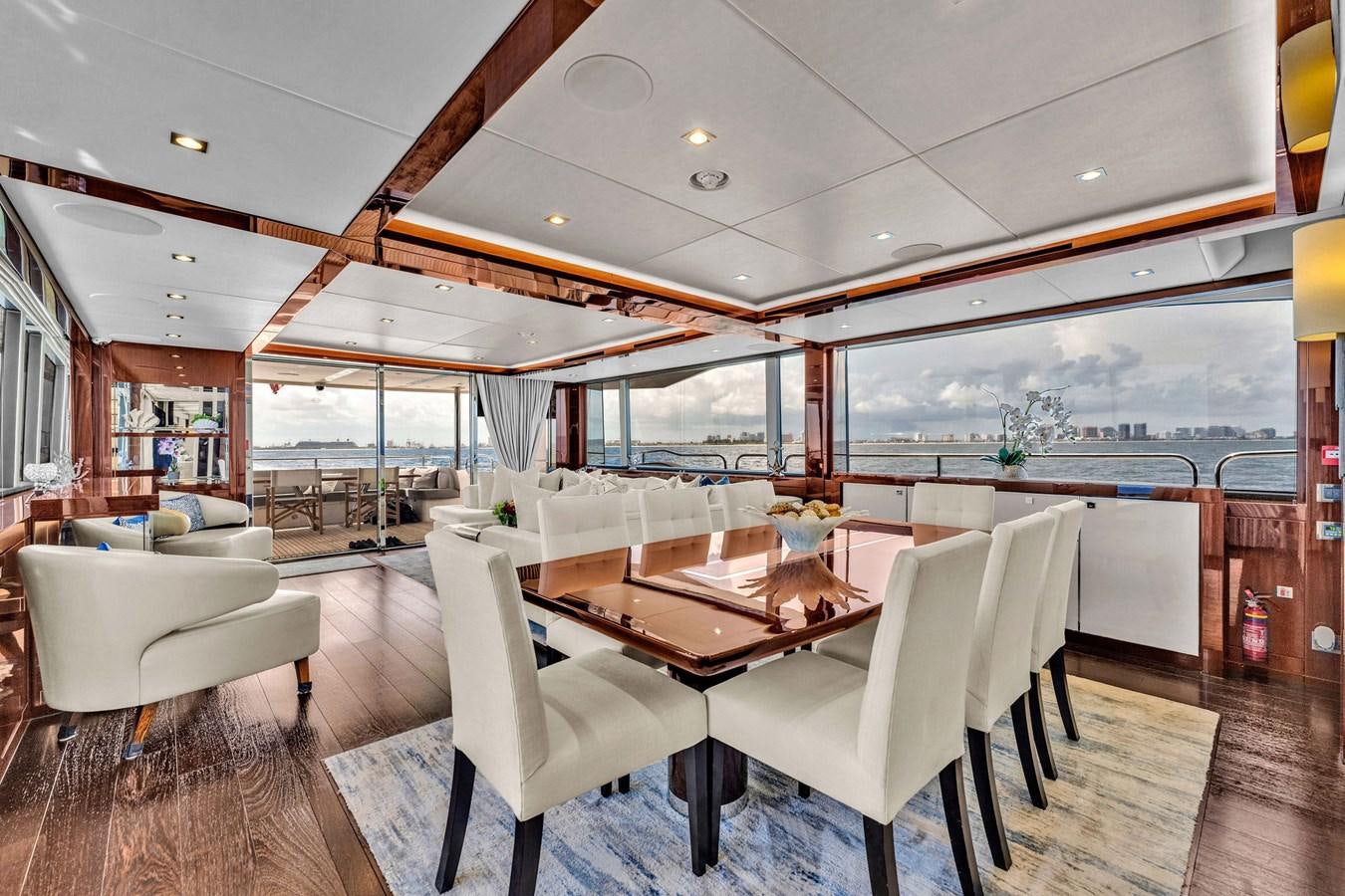a room with a table and chairs aboard 2018 SUNSEEKER 95 YACHT Yacht for Sale