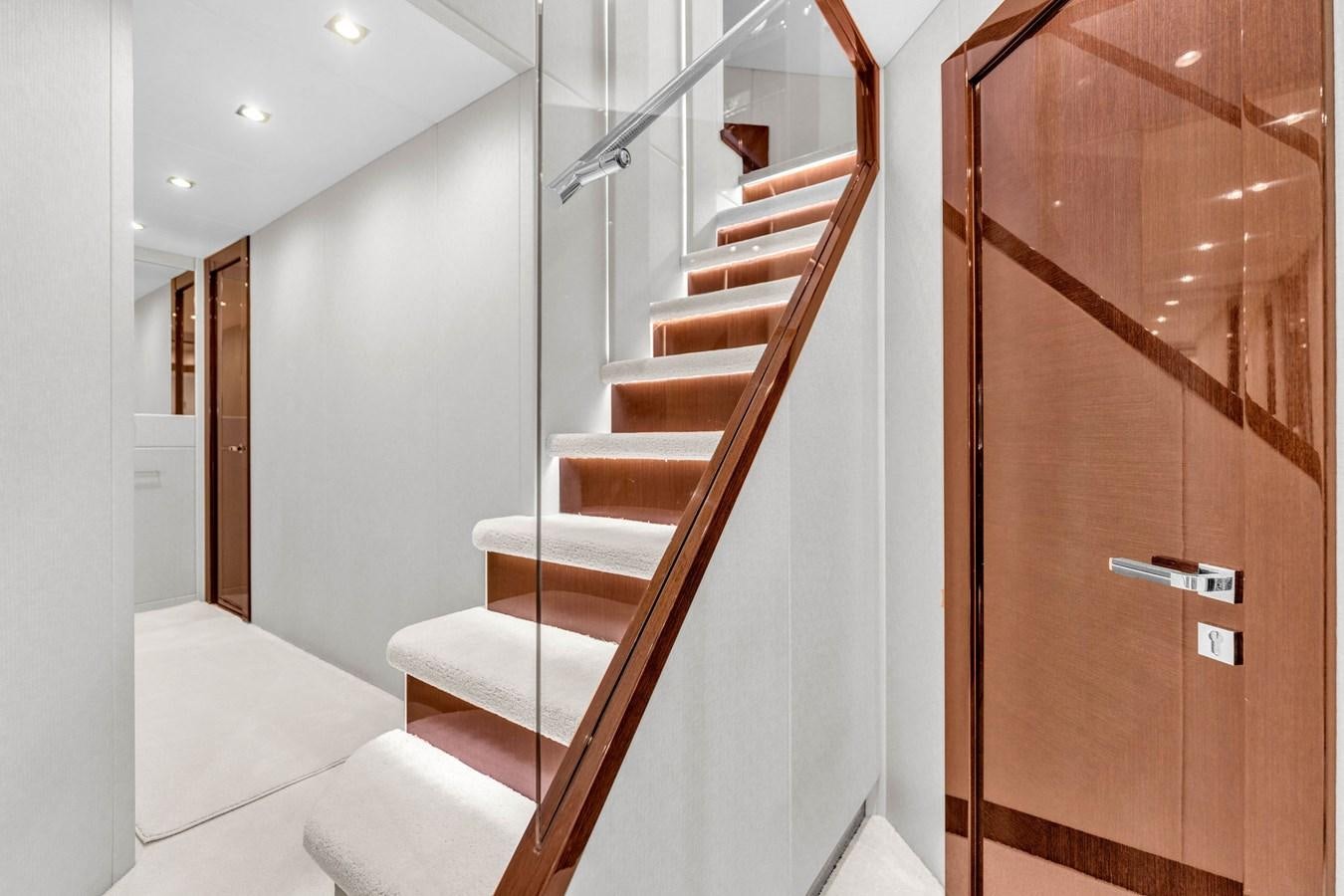 a staircase in a house aboard 2018 SUNSEEKER 95 YACHT Yacht for Sale