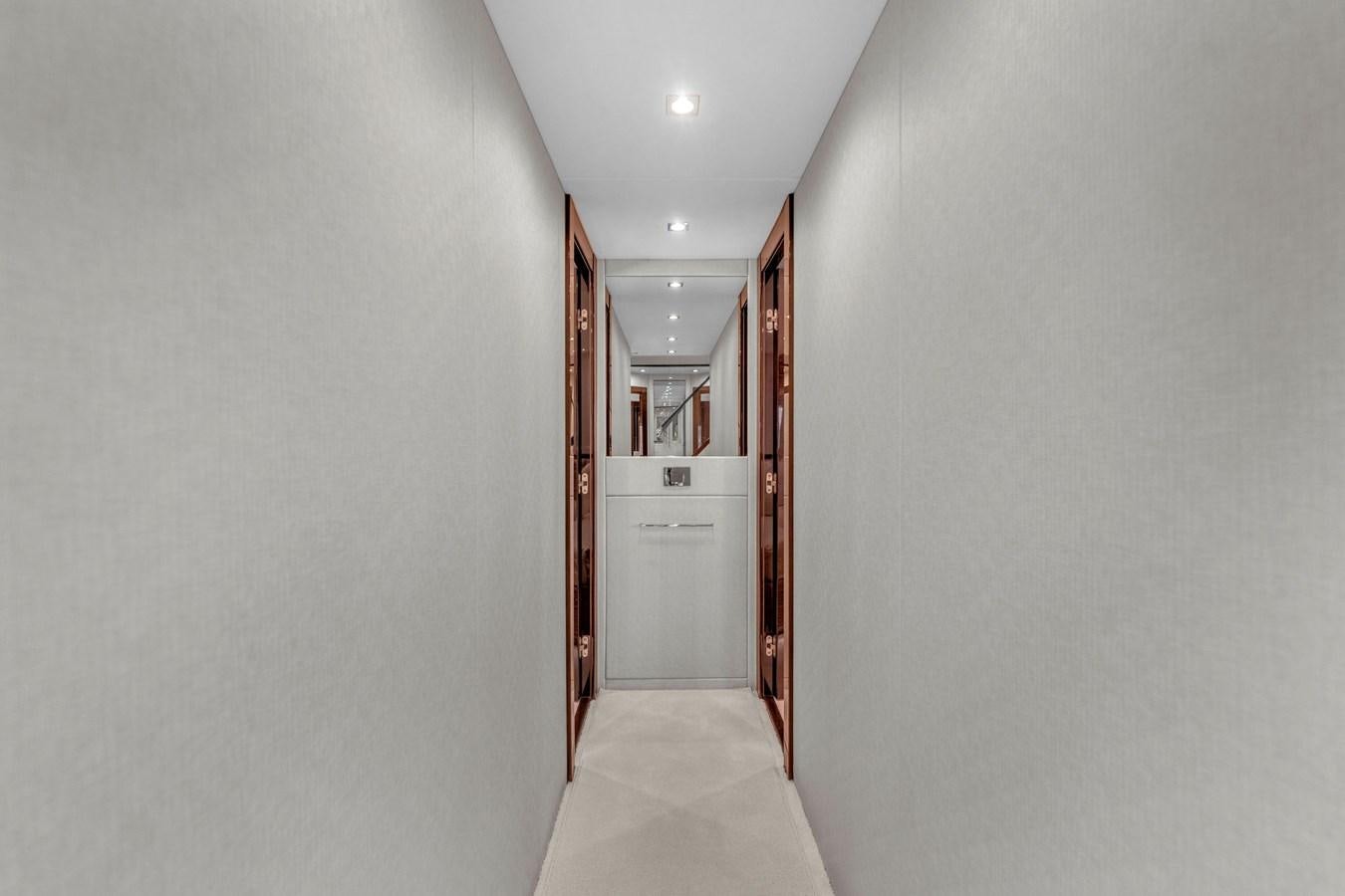 a hallway with a door aboard 2018 SUNSEEKER 95 YACHT Yacht for Sale