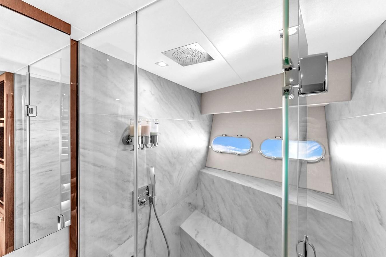 a bathroom with a shower unit aboard 2018 SUNSEEKER 95 YACHT Yacht for Sale
