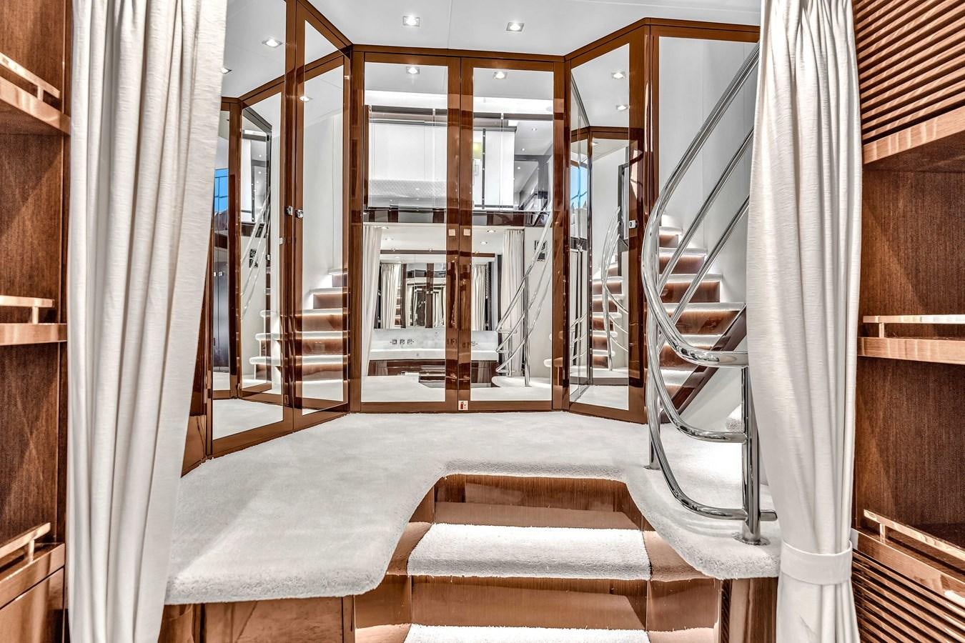 a hallway with a glass door aboard 2018 SUNSEEKER 95 YACHT Yacht for Sale