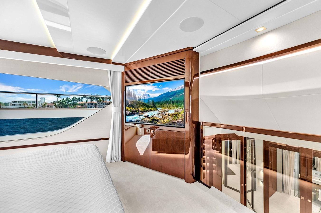 a room with a large window and a pool aboard 2018 SUNSEEKER 95 YACHT Yacht for Sale