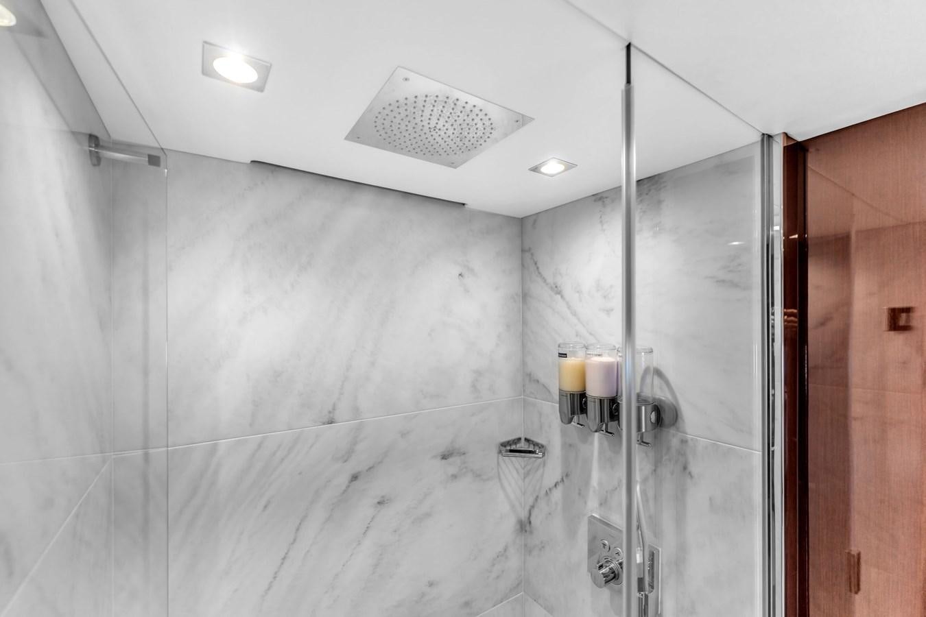 a shower unit in a bathroom aboard 2018 SUNSEEKER 95 YACHT Yacht for Sale