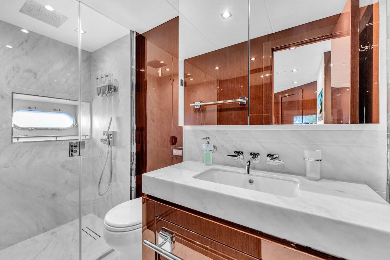 a bathroom with a sink and a toilet aboard 2018 SUNSEEKER 95 YACHT Yacht for Sale