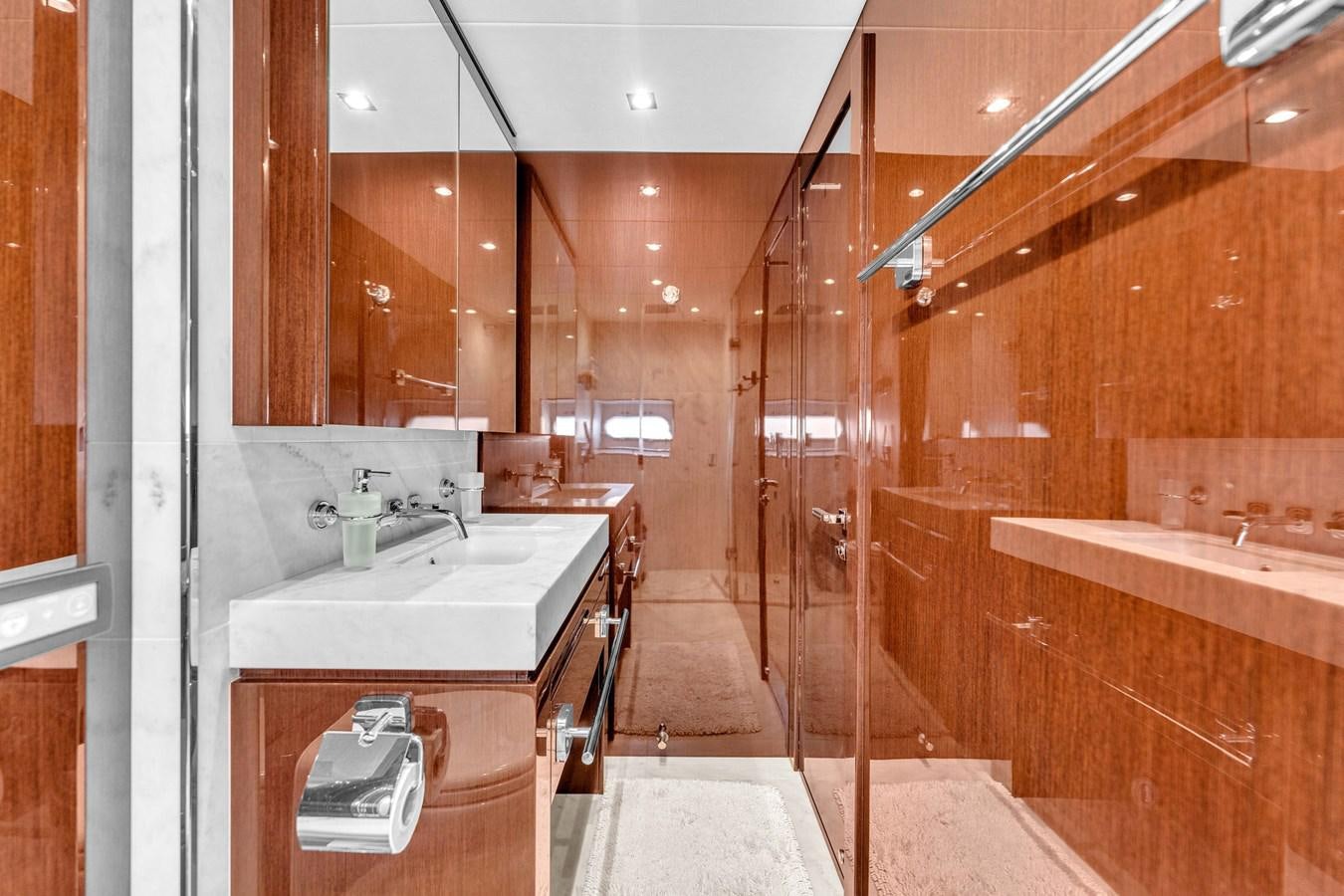 a bathroom with a sink and a shower aboard 2018 SUNSEEKER 95 YACHT Yacht for Sale
