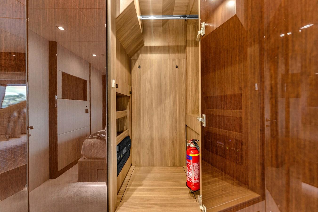 a room with a wood floor and a shelf with a can on it aboard 2018 SUNSEEKER 95 YACHT Yacht for Sale