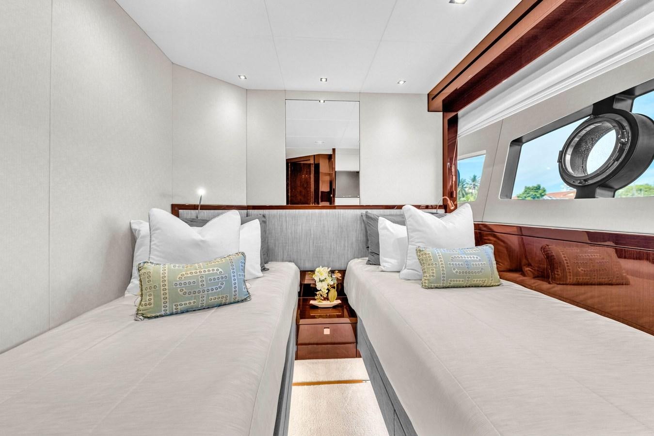 a room with two beds aboard 2018 SUNSEEKER 95 YACHT Yacht for Sale