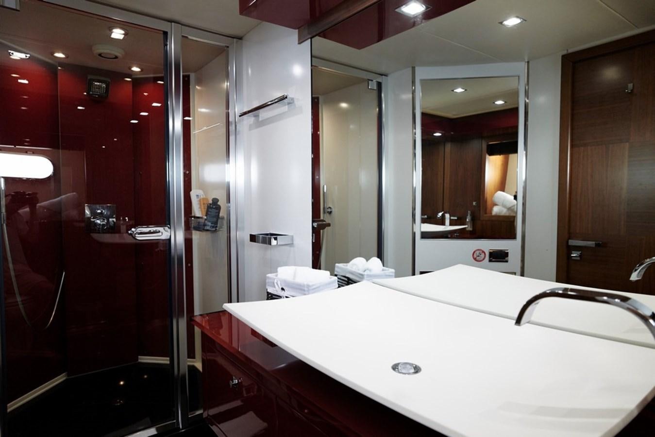 a bathroom with a large mirror aboard SUNSEEKER PREDATOR 92 Yacht for Sale