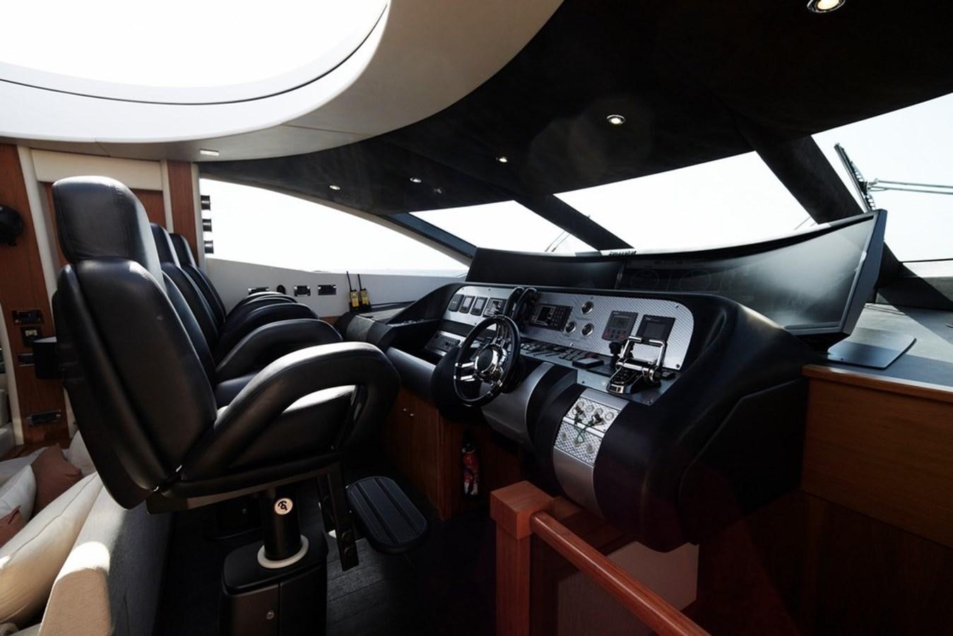 the inside of a car aboard SUNSEEKER PREDATOR 92 Yacht for Sale