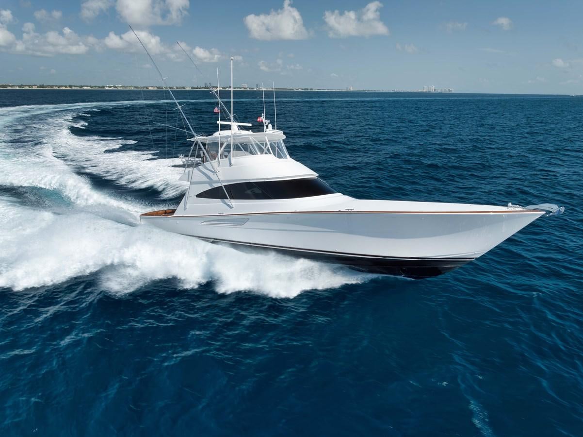 a white boat on the water aboard GYS TRADE Yacht for Sale