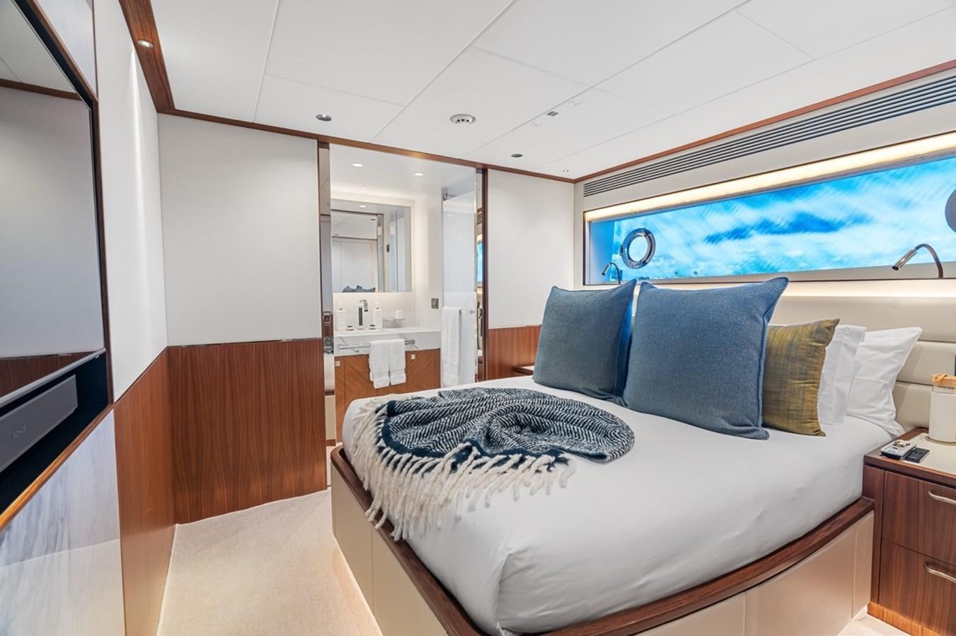 a bed in a room aboard JEMILY II Yacht for Sale